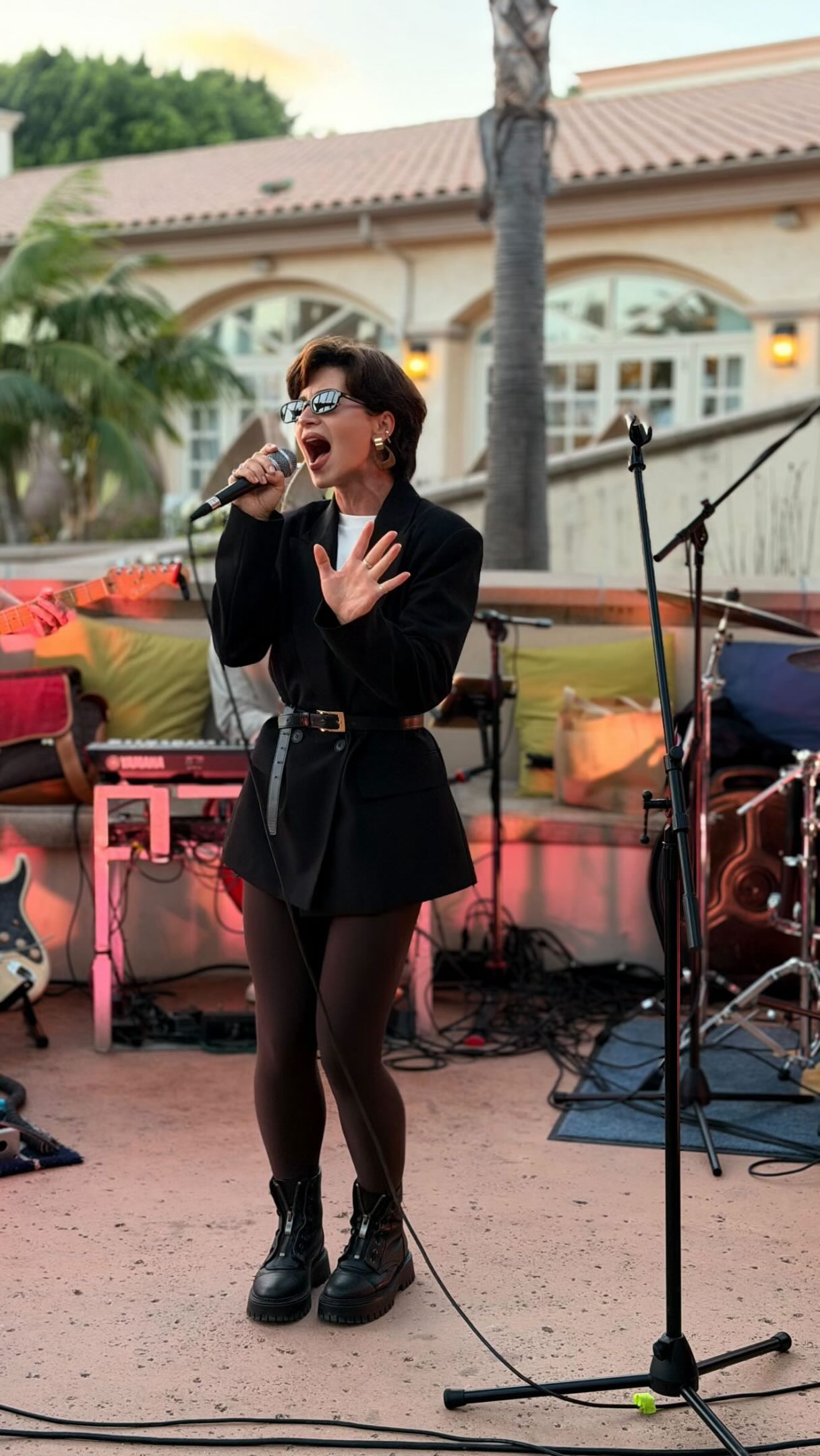 Veronika Erler singing on an outdoor stage